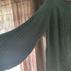 Dark green cable sweater